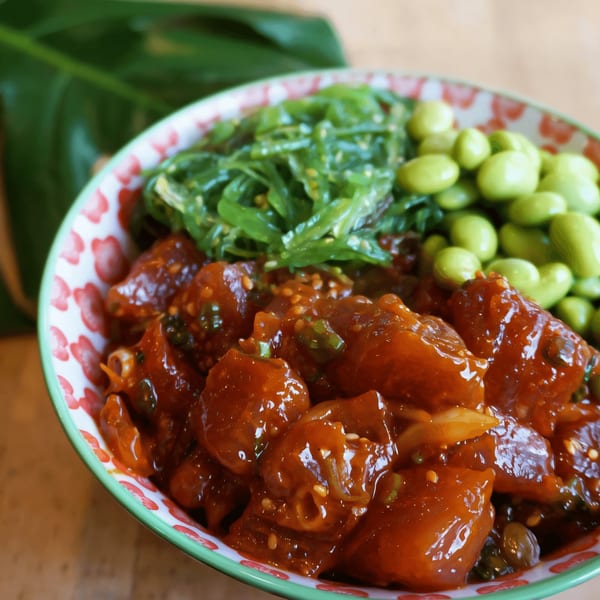 Ali'i Hawaiian Grill's poke bowl with marinated tuna, bright green edamame, and seaweed salad.